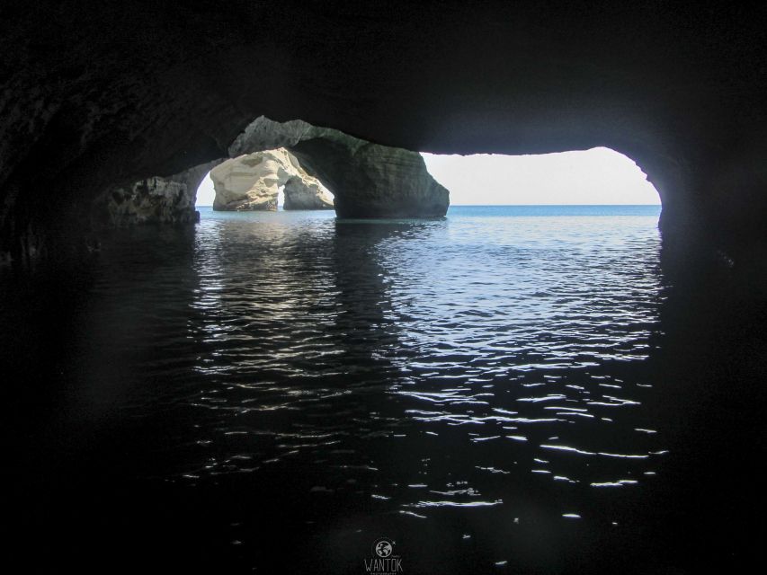 Adamantas: Milos Sightseeing Sailboat Cruise - Sykia Cave: dinghy passage, green water snorkel, and the salt-lake pause