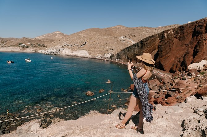 Archaeological Bus Tour To Akrotiri Excavations & Red Beach - Megalochori village: traditional streets shaped by disaster