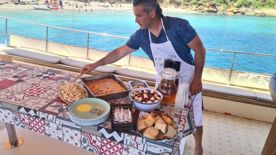 Argostoli: Full-Day Traditional Boat Cruise with Lunch - The cruise vibe: Captain humor, crew attention, and onboard dancing