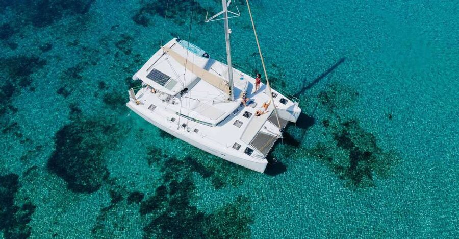 Athens: Catamaran Cruise with Fresh Lunch and Wine - Hydroussa islet: the first swim stop that sets the tone