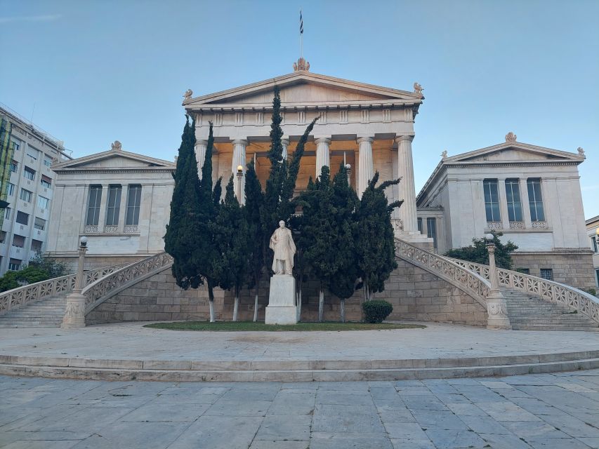 Athens: City Highlights Nighttime Walking Tour in Spanish - Zappeion Olympic Village, then Panathinaiko Stadium