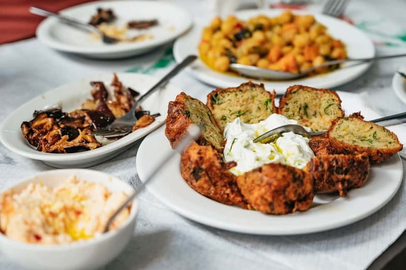 Athens: Guided Greek Food Walking Tour with Tastings - First stops in the bakery lane: koulóuria, loukoumades, and phyllo squares