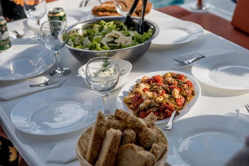 Athens: Half-Day Morning Catamaran Cruise with Meal & Drinks - Onboard lunch and drinks: seafood pasta with real Greek warmth