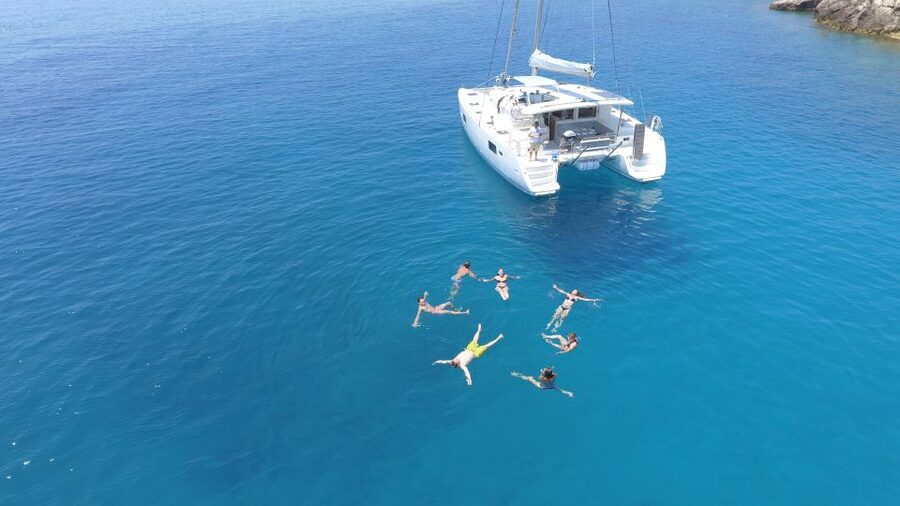 Athens: Riviera Catamaran Cruise with Meal and Drinks - Drinks and music: Greek wine and beer with a low-pressure mood