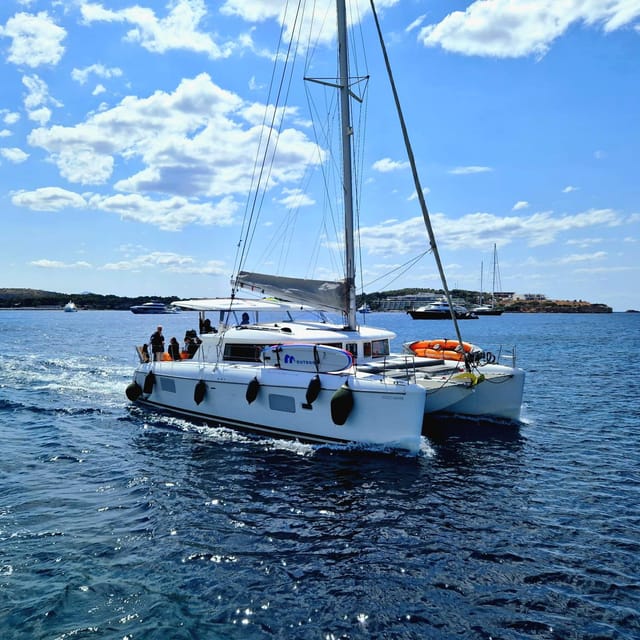 Athens: Riviera Catamaran Tour with Fresh Meal and Drinks - Vouliagmeni and Asteras Bay swim stop: calm water is the point