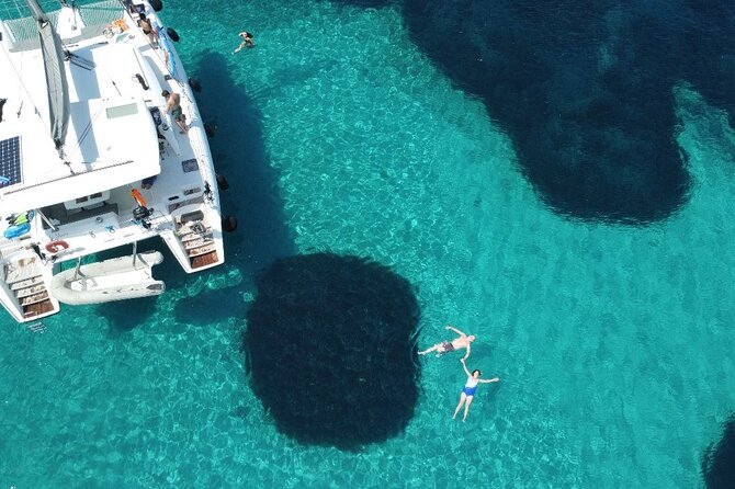 Athens Riviera Catamaran tour with fresh Meal Drinks and Swimming - First Swim Stop at Vouliagmeni Bay