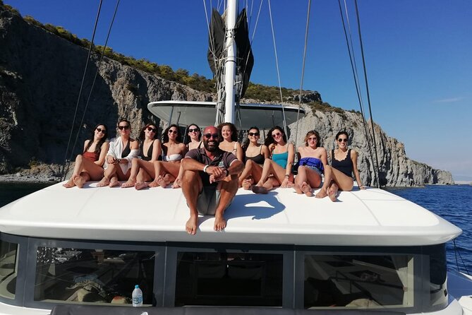 Athens Semi private Morning Catamaran cruise with meal & drinks - Vouliagmeni Beach swim stop near Astir Beach Hotel