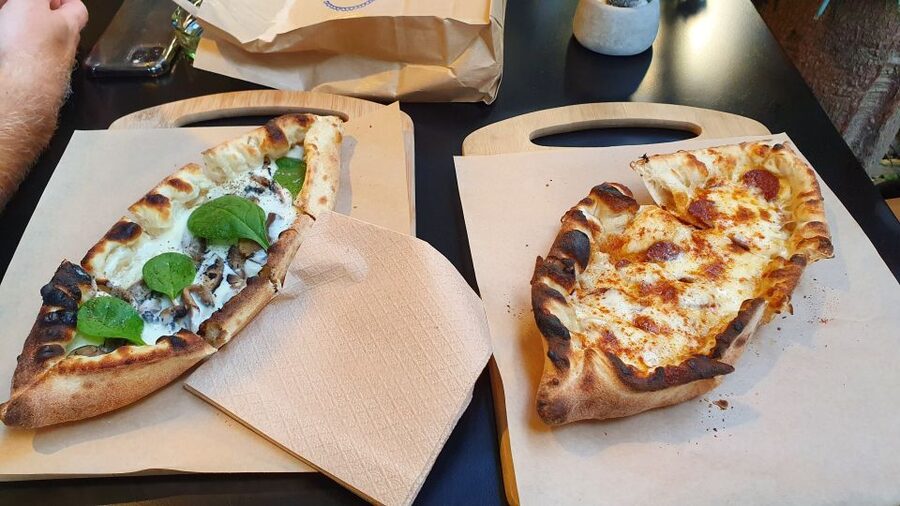 Athens: Street Food Tasting Tour - The shopping district stroll and a boat-shaped pizza moment