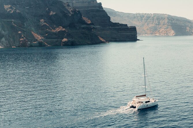 Beautiful Day Catamaran Caldera Cruise incl. Meal & Drinks - Stop 2 and the Volcanic Red Beach Snorkel Moment
