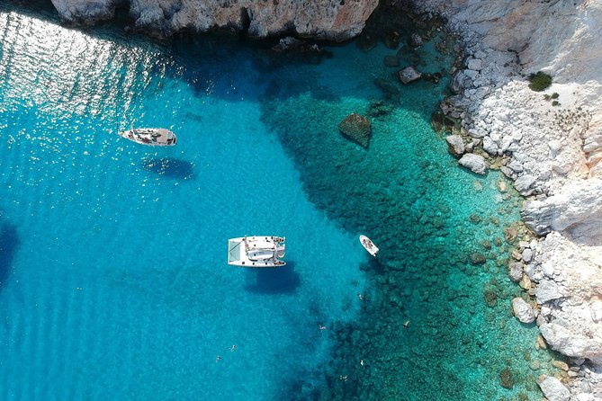 Best of Milos and Poliegos Catamaran snorkelling Cruise with BBQ - Kleftiko Beach: pirates, caves, and BBQ lunch built around snorkeling time