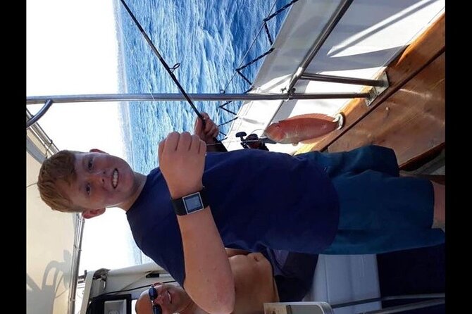 Captain Manolis Fishing with barbecue on the boat - Swimming and snorkeling time, with the sea doing the work