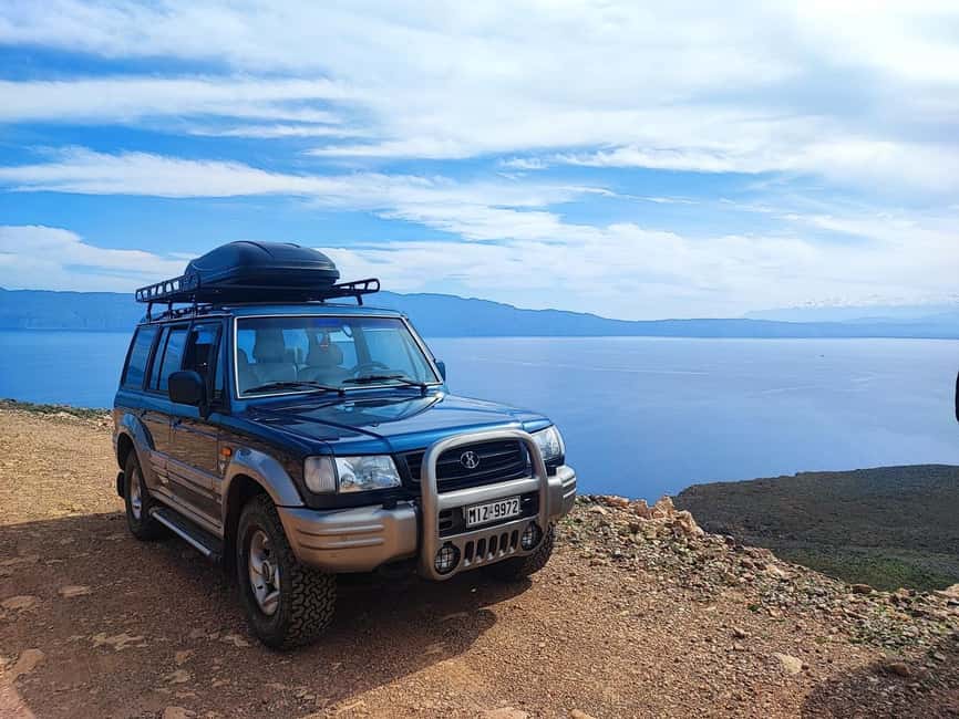 Chania: Balos Lagoon 4x4 Jeep Safari Tour from Kissamos - Balos beach time: pink sand, shallow swimming, and that walk math