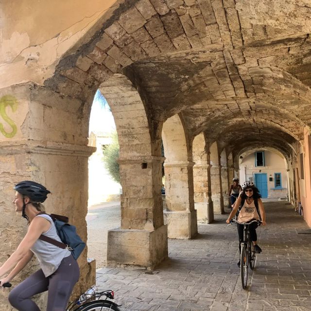 Chania: City Highlights Small Group Bike Tour - Venetian Walls of Chania, where the view starts doing the talking