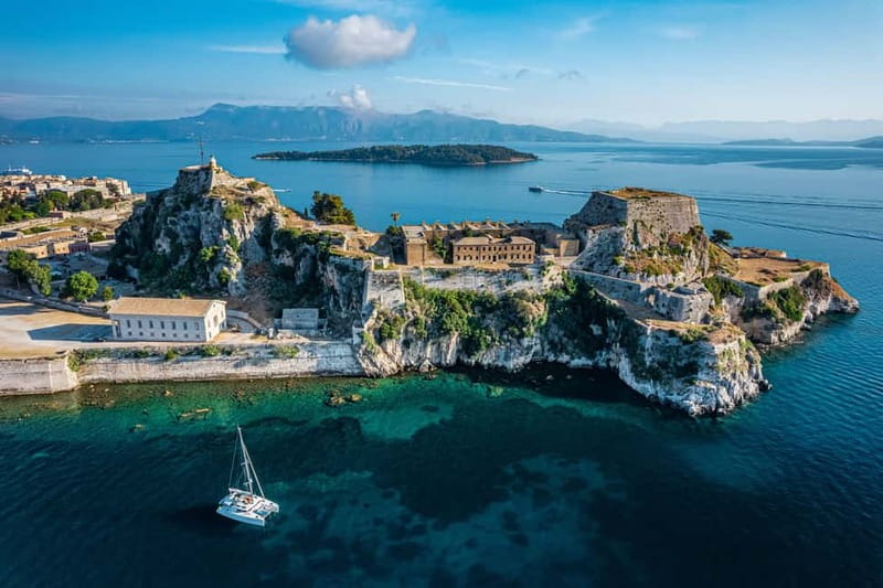 Corfu Sunset Cruise Escape with live DJ, drinks and snacks - Corfu Town at golden hour, seen from the best seat on the water