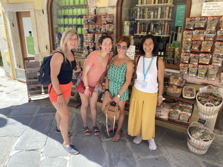 Corfu Town: Guided Walking Tour and Local Food Tastings - Sweet stops and pantry staples: halva, honey, olive oil, fruits, nuts