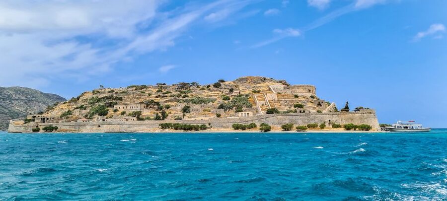 Crete: Day Trip to Agios Nikolaos and Spinalonga Island - Cruising Mirabello Bay: the part that makes Spinalonga land harder