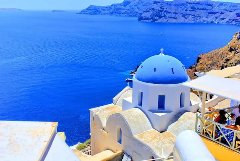 Crete: Santorini Day Trip with Fast Ferry Cruise - Island Orientation on the Bus: Learning the Caldera Story Before You Walk