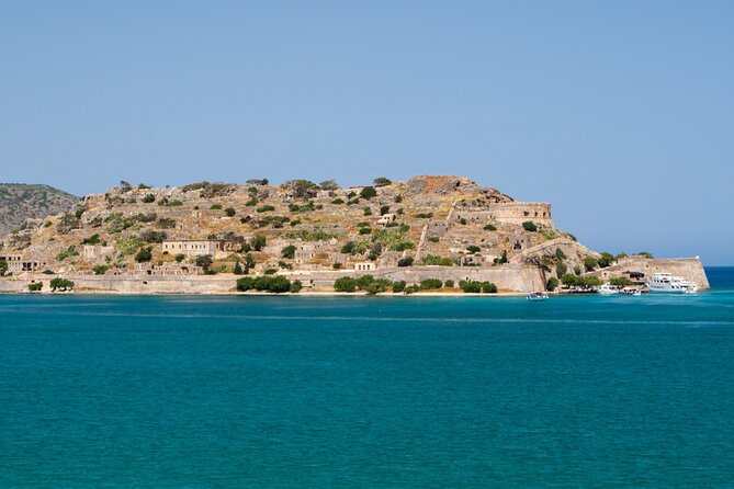 Cruise to Spinalonga, Kolokytha Bay & Agios Nikolaos with Lunch - Spinalonga Fortress: guided history, photo time, and an extra €20 ticket