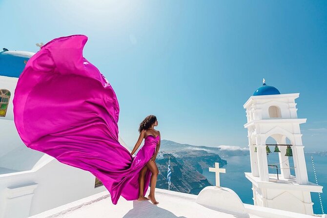 Exclusive Santorini Flying Dress Photoshoot with Pickup - Stop 1 at the Blue Dome: Rooftops, Caldera, Volcano Views