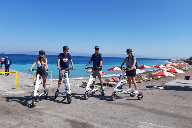 Explore the new town and the medieval town of Rhodes on scooters - 3 hours - Mandraki Harbour to windmills: New Rhodes with the best photo angles