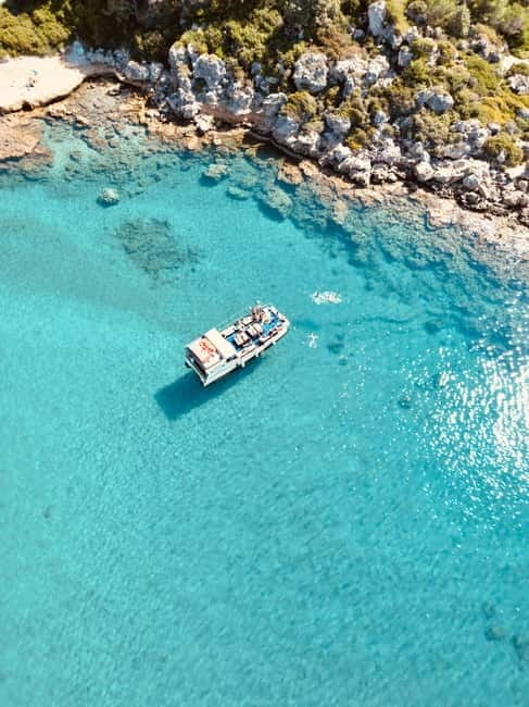 Faliraki: Boat Trip to Anthony Quinn & The Caves with Drinks - Anthony Quinn Bay: 40 minutes of swimming, snorkeling, and fish feeding