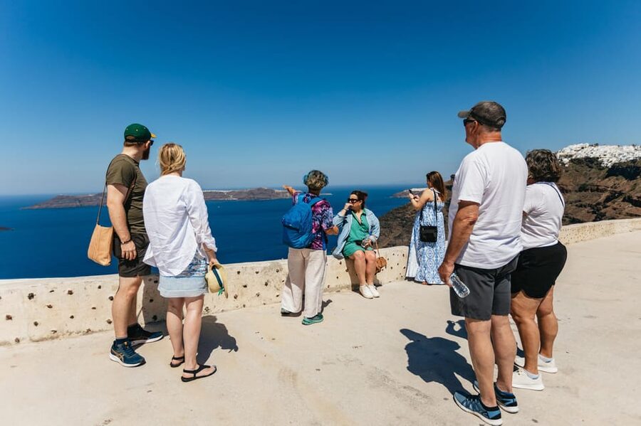Fira: Guided Foodie Walking Tour with Tastings - Honey, farmers, and local producers you can actually picture