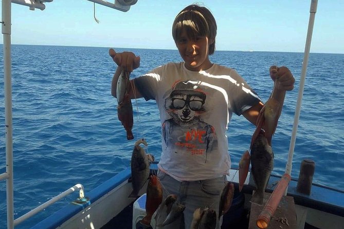 Fishing Boat Trip with Professional Fisherman (Small Group) - Lunch on board: grilled fish, Greek salad, and included drinks