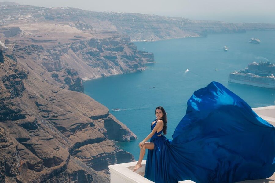 Flying dress Photoshoot in Santorini with Hotel Pickup - Posing coaching that helps you look natural fast
