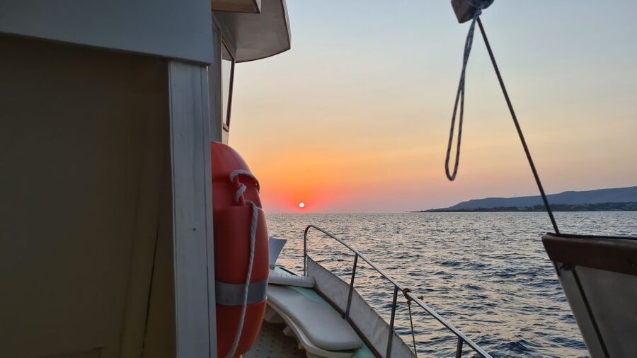 From Argostoli: Vardiani Island Sunset Cruise & Greek Meze - The sunset run: photos, music, and that Ionian Sea glow