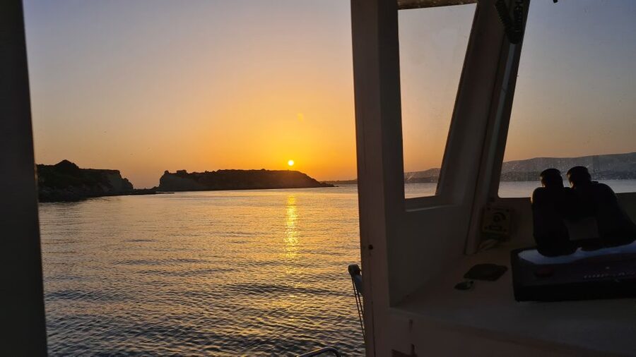 From Argostoli: Vardiani Island Sunset Cruise & Greek Meze - Xi Beach red sand night swim under the stars