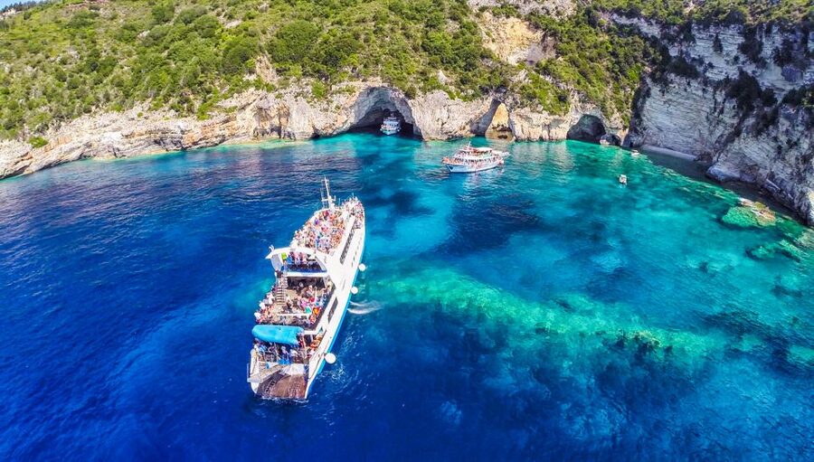From Corfu: Day Cruise to Paxos, Antipaxos, and Blue Caves - Guides, music, and the vibe: what the best days look like
