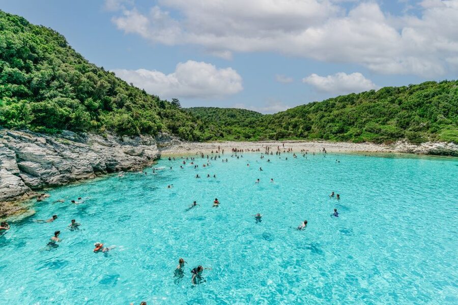 From Corfu Island: Antipaxos & Paxos Blue Caves Boat Cruise - The Party Side of the Day: Music and Greek Dancing on the Return