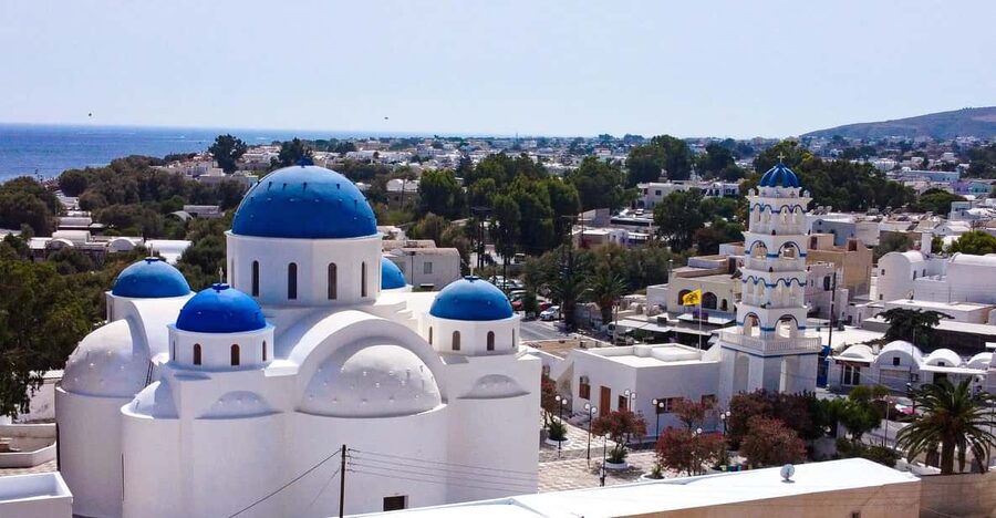 From Fira: Santorini Highlights Minibus Tour with Oia Sunset - Lighthouse and Red Beach viewpoints: when the island looks sculpted