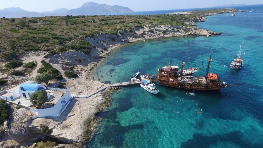 From Kos: 3-Island Pirate Cruise with Lunch and Waterslide - Checking in at Kos Harbour: find the big wooden pirate boat