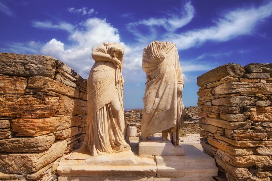 From Mykonos: Delos Archaeological Site Guided Evening Tour - Free Time Loop: Market, Sanctuary Zone, and the Theater of Delos