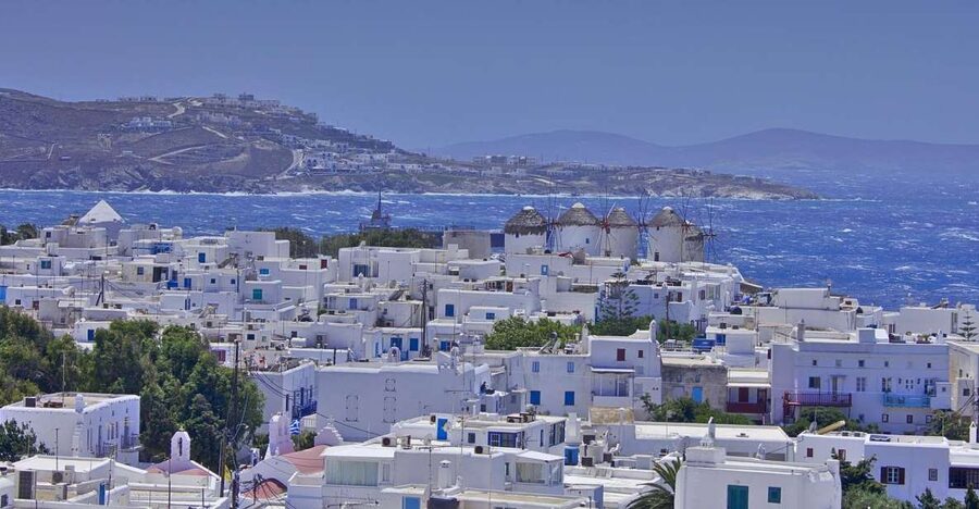 From Naxos: Round day trip to Mykonos Island - Beaches and beach bars: using buses or a rental without losing the ferry
