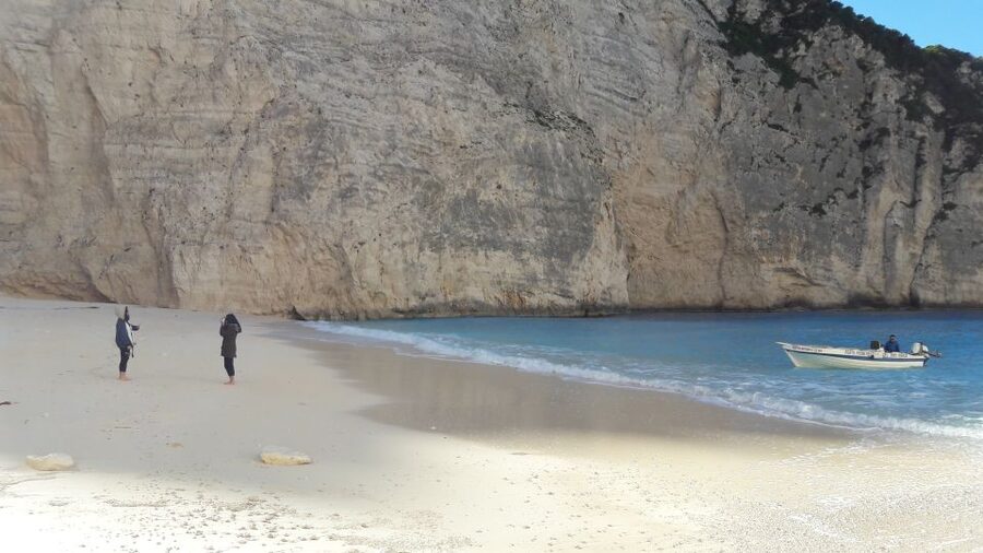 From St.Nikolaos: Boat Cruise to Navagio Beach & Blue Caves - Blue Caves on a glass-bottom viewing run, plus swim time
