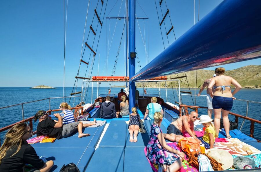 From the Port of Kos: Full Day Boat Cruise to 3 Islands - Kalymnos Vathi: Fjord Views, Rugged Coast, and an Hour to Wander