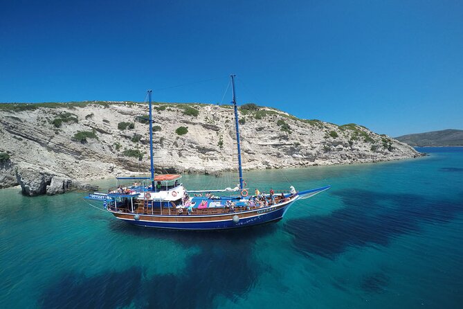 Full Day 3-Island Boat Cruise from Port of Kos - Seating, shade, and swim logistics on a full boat day