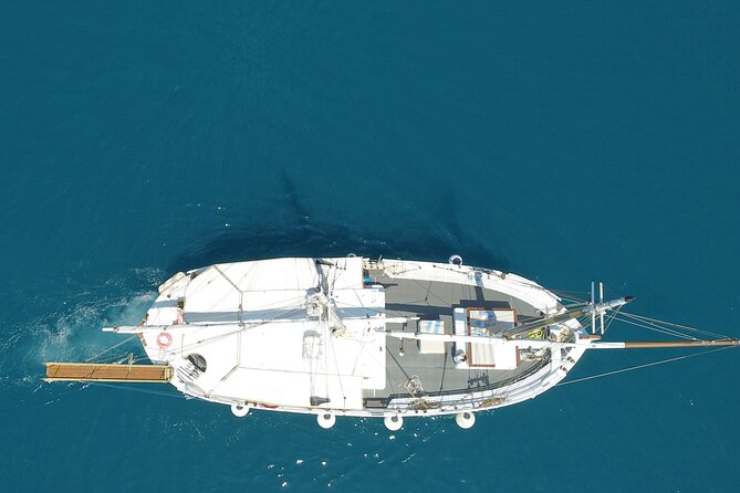 Full Day Cruise from Corfu in Classic Wooden Vessel, Swim & BBQ - Drinks, Wi-Fi, and deck comfort on a full (but not huge) boat