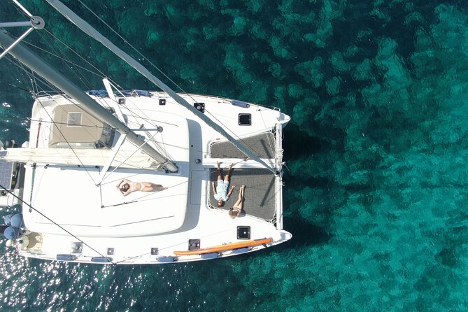 Full-Day Small-Group Cruise in Milos & Poliegos with Lunch - Gerakas Beach, golden sand, and the hot spring moment