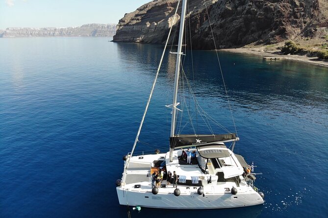 Half-Day Exclusive Catamaran Cruise in Santorini with Meal and Open Bar - The open bar and BBQ meal: why this cruise feels like value
