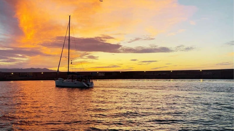 Heraklion: Dia Island Sunset Boat Tour with Dinner - Dia Island arrives: Saint George Bay anchor time