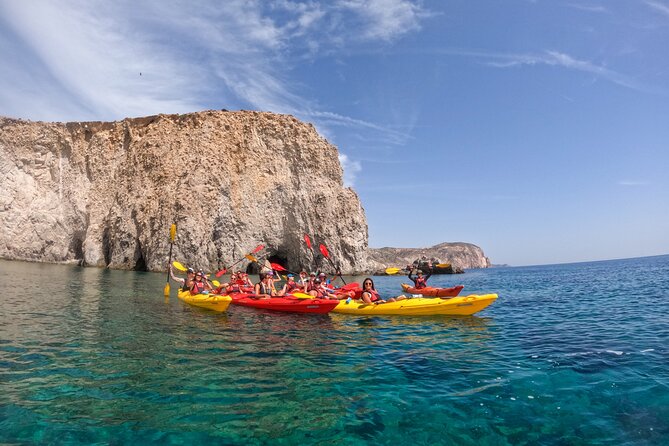 Kayaking Tour to the secrets of Milos - Tsigrado Beach: golden sand, sea caves, and clear-water snorkeling