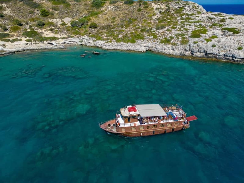 Kolympia : Transfer & Cruise to Lindos with 3 Swimming Stops - Navarone Bay swim stop: quick snorkeling and first clear-water hit