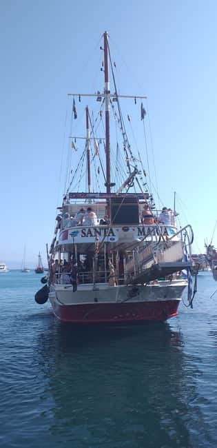 Kos: 3-Island Cruise with Lunch, Swimming and Audio Guide - The Dodecanese cruise start: open water, sea views, and a dolphin loop