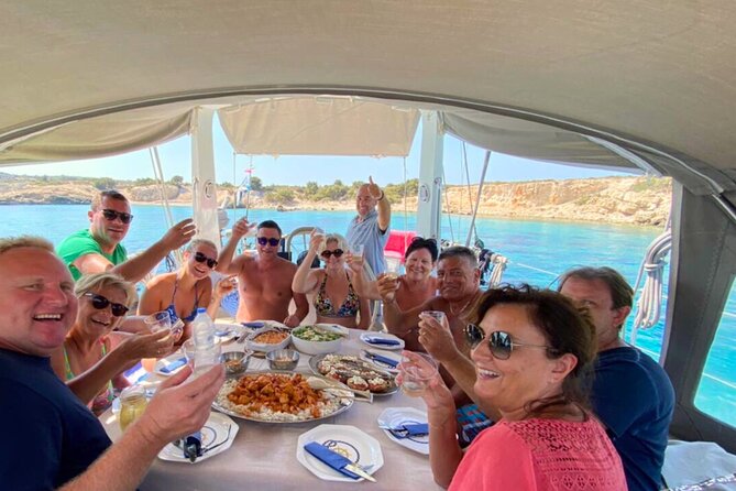 Kos: Small Group Full-Day Sailing with Meal, Drinks, & Swim - Stop one: a secluded bay for snorkeling and clear-water swimming