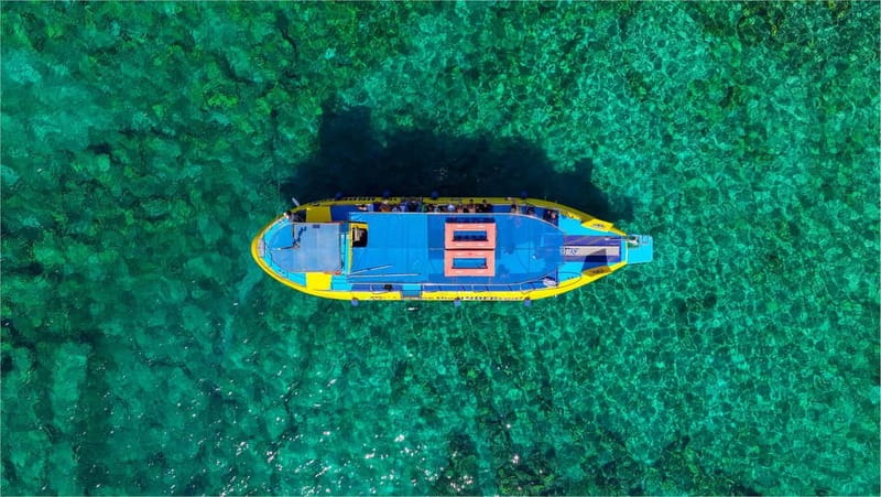 Lindos: Submarine Cruise with Swimming Stop at Navarone Bay - Navarone Bay swim stop: crystal-clear water and real downtime