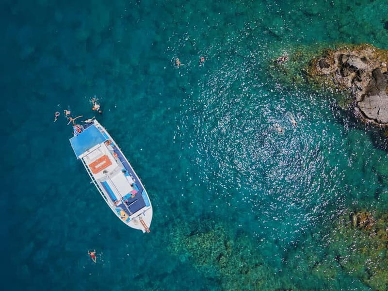 Lindos: Sunset Cruise with Unlimited Aperol, Beers & Wine - Swimming and Snorkel Breaks, Plus the Hidden Cave Factor