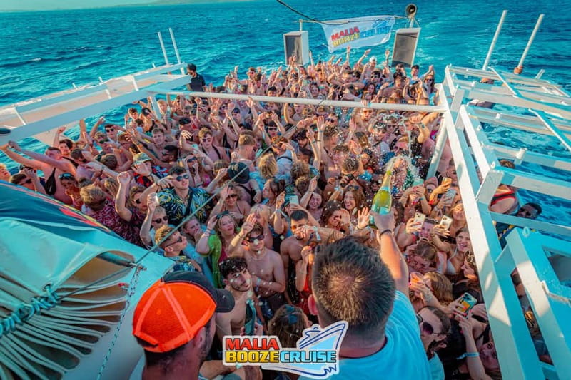 Malia: Booze Cruise Boat Party with Live Dj - On-board energy: DJs, MCs, drinking games, and the big party feel